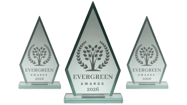 Three glass trophies for the Evergreen Awards 2026 in varying sizes